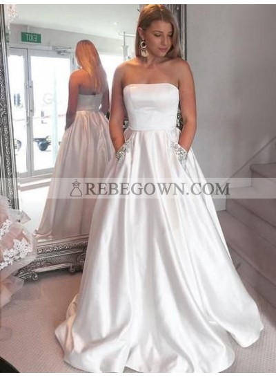 2023 New Arrival Satin A Line Strapless Beaded Long White Prom Dresses With Pockets 