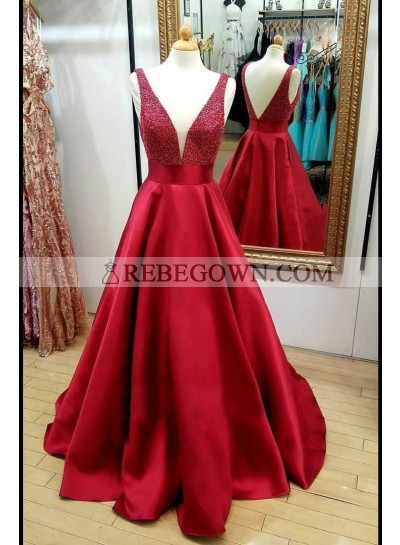2023 Elegant A Line Satin Red Beaded V Neck Backless Long Prom Dresses